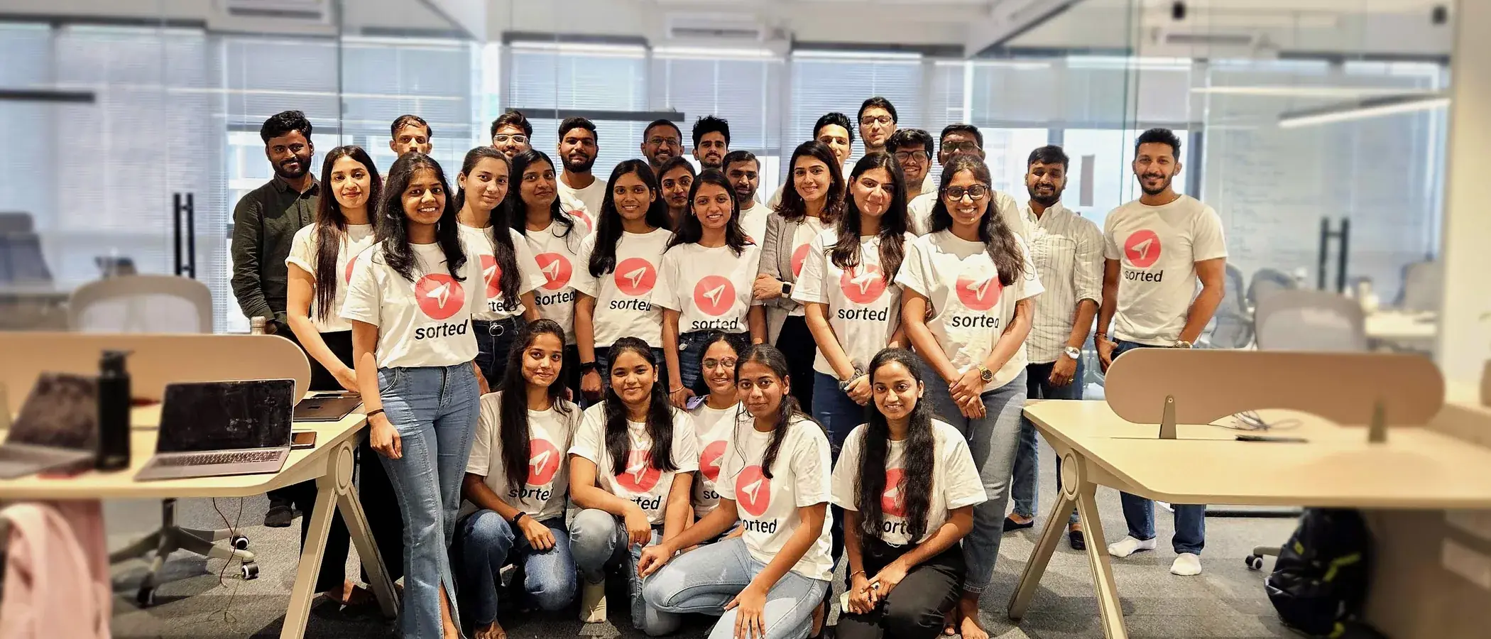 The Sorted team in matching Sorted t-shirts at the Pune office